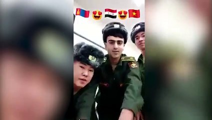 عنصر من ميليشيا أسد يسخر من جندي صيني "انت قد سوريا يا فدان" (فيديو)