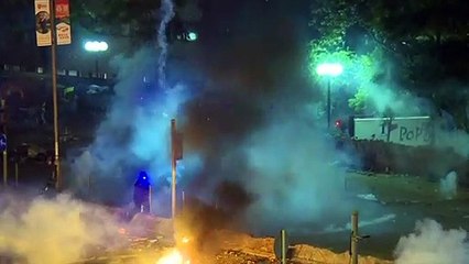 HK riot police and protesters clash at university campus