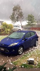 Surprise Hail Storm Smashes Car in Seconds