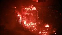 Fire rages at Hong Kong campus entrance as protesters fend off police - AFP