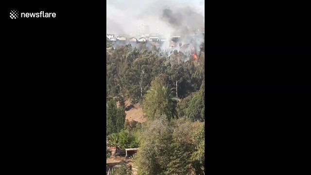 Fires in Chile continue to blaze through hills