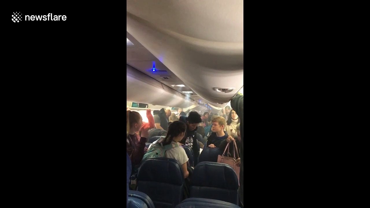 Delta flight passengers forced to evacuate after smoke fills plane cabin in Madrid