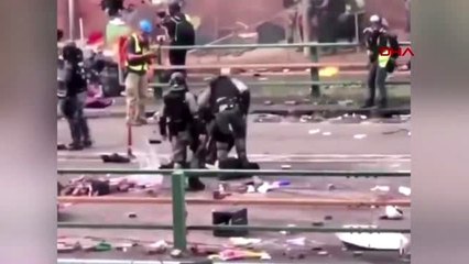 Hong kong polisi yerde sürüklenen eylemcinin kafasına bastı