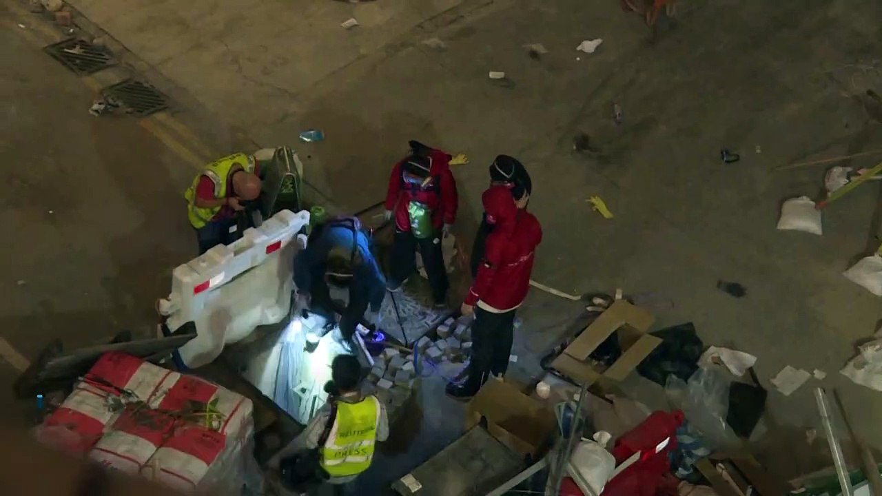 Hong Kong protesters attempt escape via sewage system