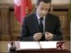 Sarkozy gratte stylo pendant sa visite en Roumanie