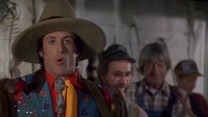 Sylvester Stallone singing a country drinking song