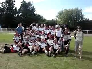 Photo de fin de match ac cri de guerre