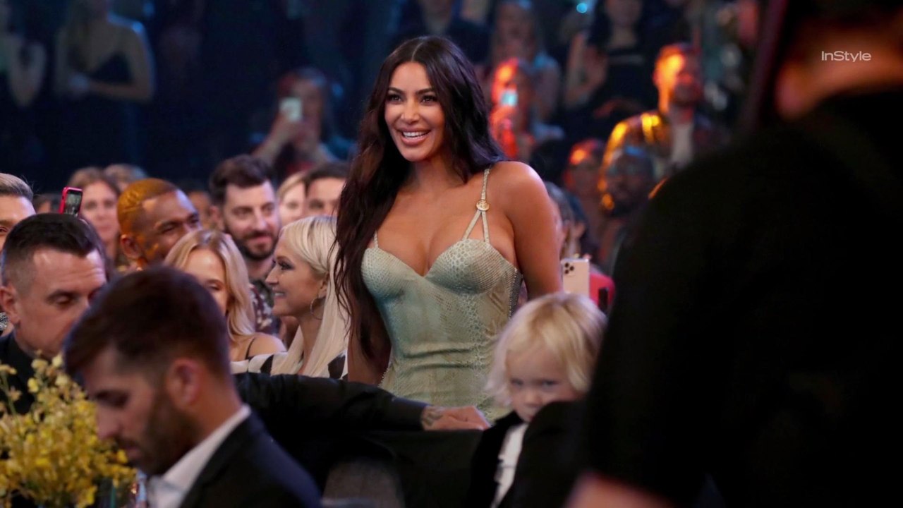 Kim Kardashian Looks Relatably Annoyed That Her Versace Dress Doesn't Fit