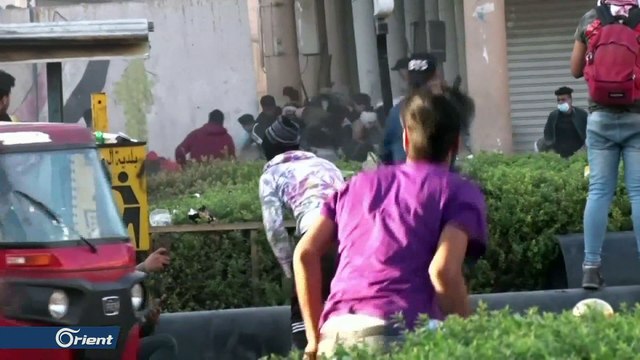 قتلى وجرحى بمواجهات بين قوات حكومة بغداد والمحتجين وسط العاصمة