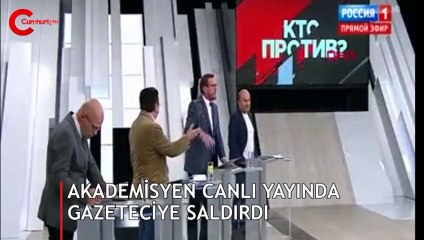 Akademisyen canlı yayında gazeteciye saldırdı!