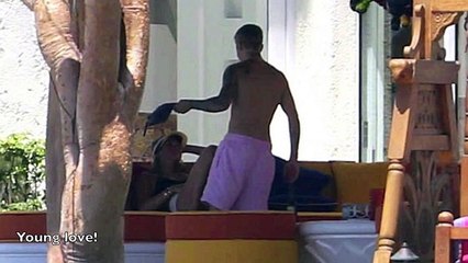 Justin Bieber se pone caliente con su novia y un empleado del hotel le corta el rollo