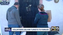 Phoenix Rescue Mission volunteers deliver turkeys to families