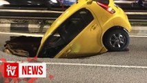 Sinkhole that swallowed car being repaired