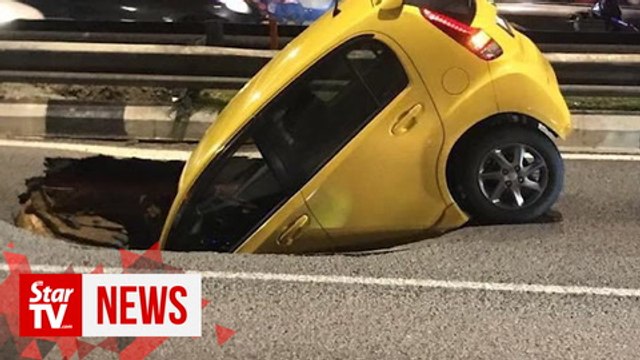 Sinkhole that swallowed car being repaired