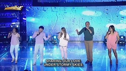 The Company sings Laughter in the Rain