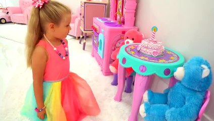 Diana and Roma play with Giant Teddy bears