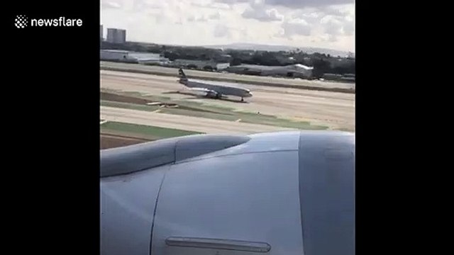 Woman captures the terrifying moment passengers onboard Philippine Airlines flight discover engine is on fire