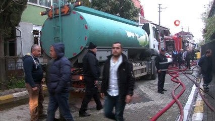 Evinin yanışını gözyaşlarıyla izledi