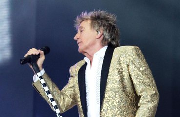 Sir Rod Stewart wears socks and a vest in bed