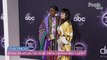 Kesha Wears Belted Robe Dress as She Poses with Big Freedia on AMAs Red Carpet Ahead of Performance