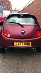 Car Launches into Wall Leaving Exhaust Shop