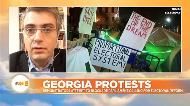 Georgian riot police deploy water cannon as protesters in Tbilisi try to blockade parliament