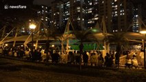 Hong Kong pro-democracy activists take respite from protests with night-time classical music concert in park