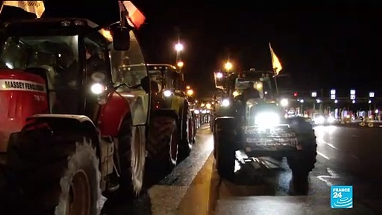 French tractors roll into Paris to protest agai...