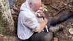Homem chora após salvar a sua cadela presa na toca de uma raposa