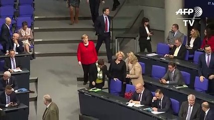 Merkel defiende la OTAN tras las críticas de Macron