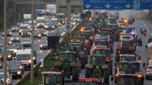 Farmers on tractors block Paris roads in protest