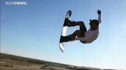 На доске по барханам