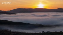 Time-lapse footage of sunset overlooking dense fog bank shrouding the Upper Eden Valley in Cumbria