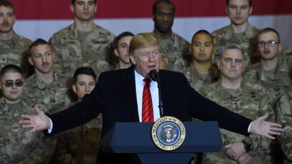 In surprise trip to Afghanistan, Trump says Taliban talks resumed