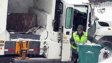 Side Loader Garbage Truck Collecting Garbage 1-28-2019