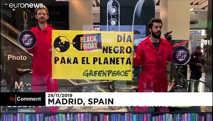 Black Friday protesters picket Amazon as Greenpeace demonstrate in Madrid