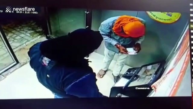 Bungling thieves leave behind cash while trying to uproot ATM machine