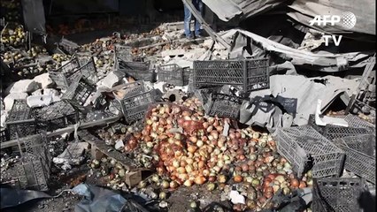 Aftermath of Syria regime strike on Idlib market