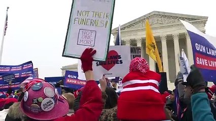 Activists gather at US Supreme Court as it takes up gun control case