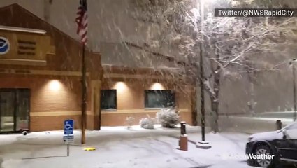 Late-night snow covers Rapid City