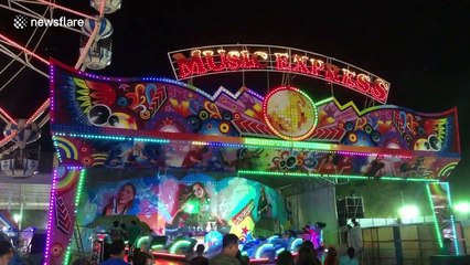 New footage shows people thrown from fairground ride when safety bar opens