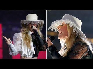 Ellie Goulding pulls off a lampshade hat and we don't know how