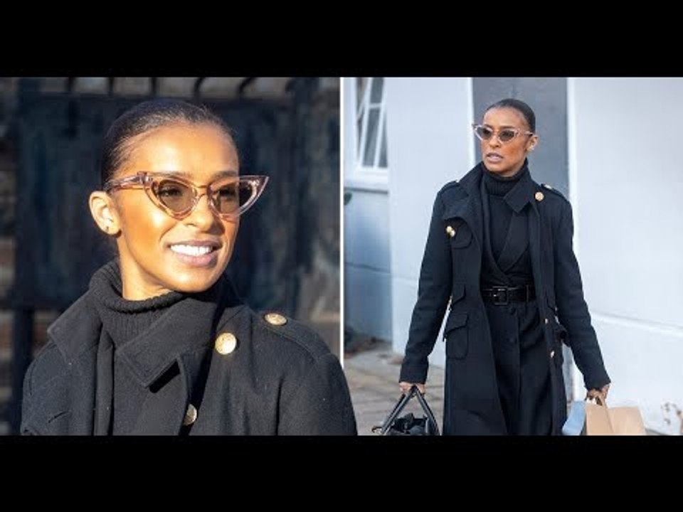 Melody Thornton nothing but smiles as she's seen following Pussycat Dolls comeback