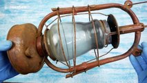 Ukrainian man Restored an old rusty oil lamp 1950s