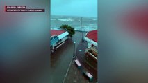 Giant waves crash into the shores of Mauban, Quezon Province by Typhoon Tisoy