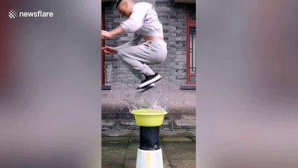 Chinese man shows off incredible kung fu skills by jumping on water