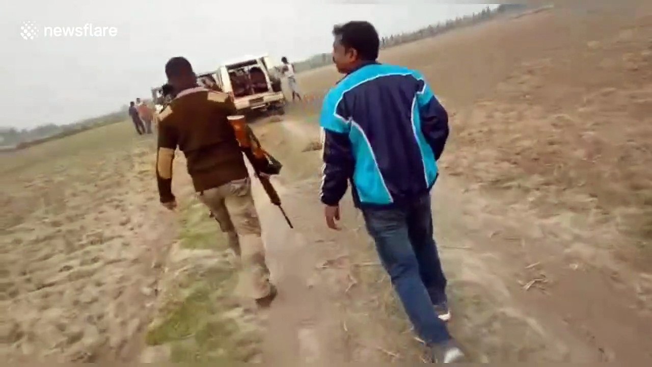 Leopard viciously leaps at rescue workers trying to save it in rural India