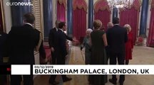 Queen Elizabeth hosts NATO leaders at Buckingham Palace as protesters gather outside