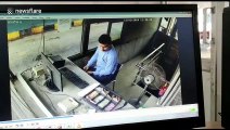 Indian toll booth camera shows employee sent flying back when truck smashes into his station