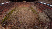 Auburn Fans Attempting to Rush Field Get Stuck in Bushes